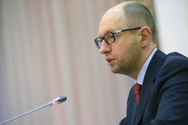 Arseny Yatsenyuk, a member of Ukraine's interim leadership, speaks during a government meeting in parliament in Kiev March 1, 2014.  Russia's Foreign Ministry said on Saturday that Moscow was "extremely concerned" about recent developments in Ukraine's Crimea, which it said confirm the desire of Kiev's politicians to destabilise the situation on the peninsula.  REUTERS/Andrew Kravchenko/Pool  (UKRAINE - Tags: POLITICS CIVIL UNREST)